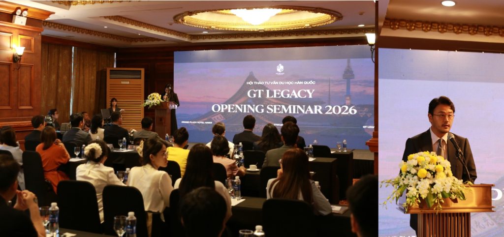 GT Legacy Opening Seminar 2026 - toàn cảnh hội trường và diễn giả phát biểu tại Grand Plaza Hotel Hà Nội